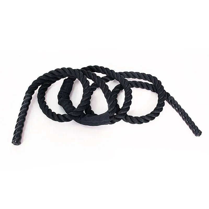 Heavy jump rope with a 25mm diameter, designed for strength training and endurance workouts. Durable and weighted for an intense fitness routine, ideal for improving coordination, agility, and muscle building. Suitable for both indoor and outdoor use.- TNT Fitness Gear