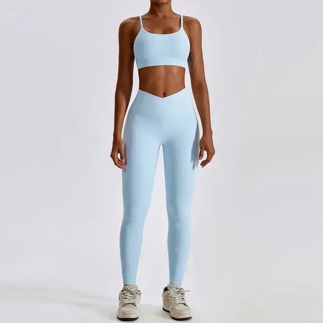 Stylish and comfortable women's two-piece fitness gym wear set featuring a matching sports bra and high-waisted leggings. Ideal for workouts, yoga, and casual wear, made from stretchy, moisture-wicking fabric