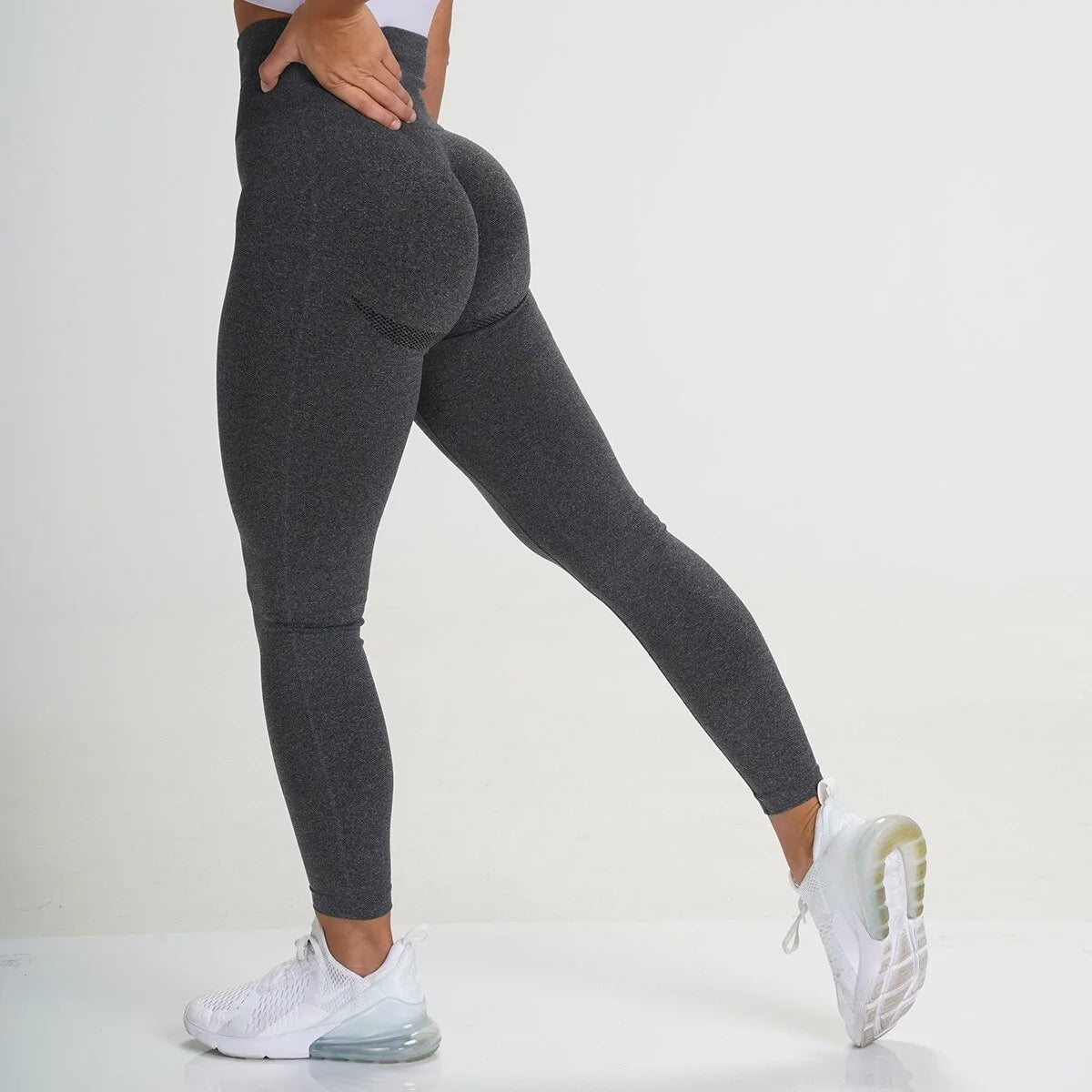 Seamless high-waist workout leggings for women, designed to provide a sleek, supportive fit. Made from stretchy, breathable fabric for maximum comfort and flexibility. Perfect for workouts, yoga, or stylish casual wear -TNT Fitness Gear