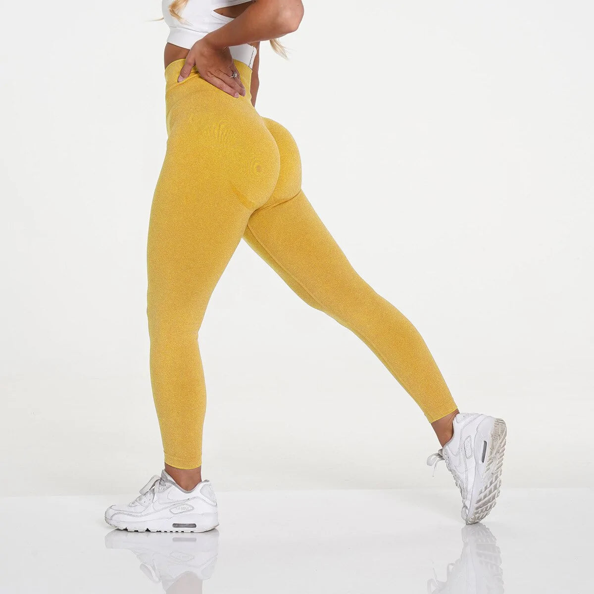 Seamless high-waist workout leggings for women, designed to provide a sleek, supportive fit. Made from stretchy, breathable fabric for maximum comfort and flexibility. Perfect for workouts, yoga, or stylish casual wear -TNT Fitness Gear