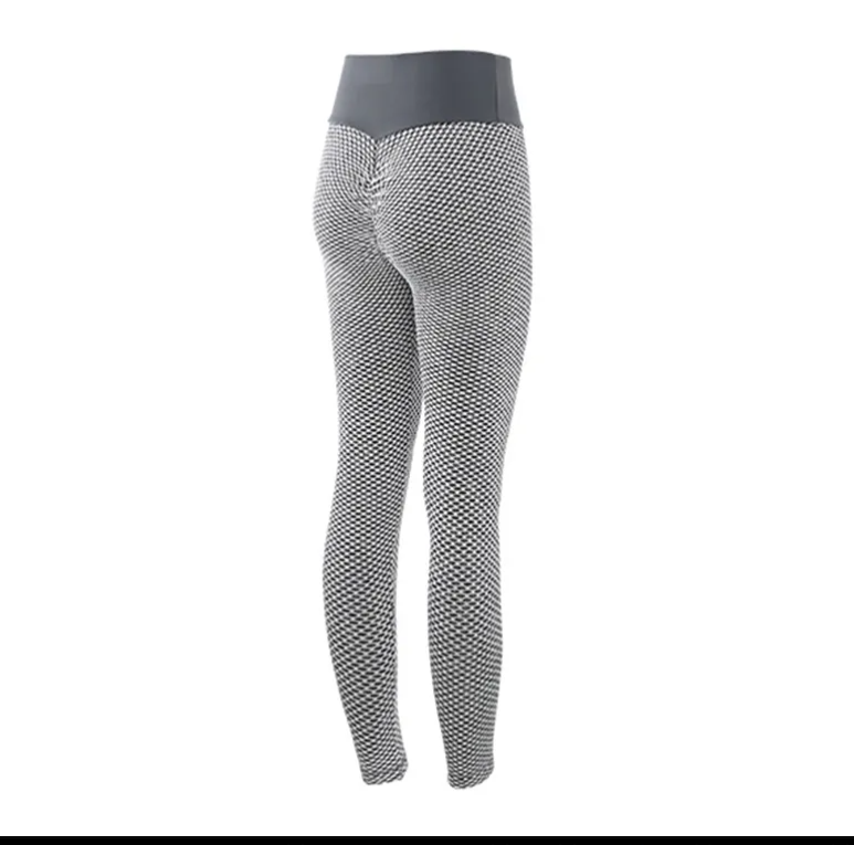 Black and white patterned leggings with a gray waistband on a white background