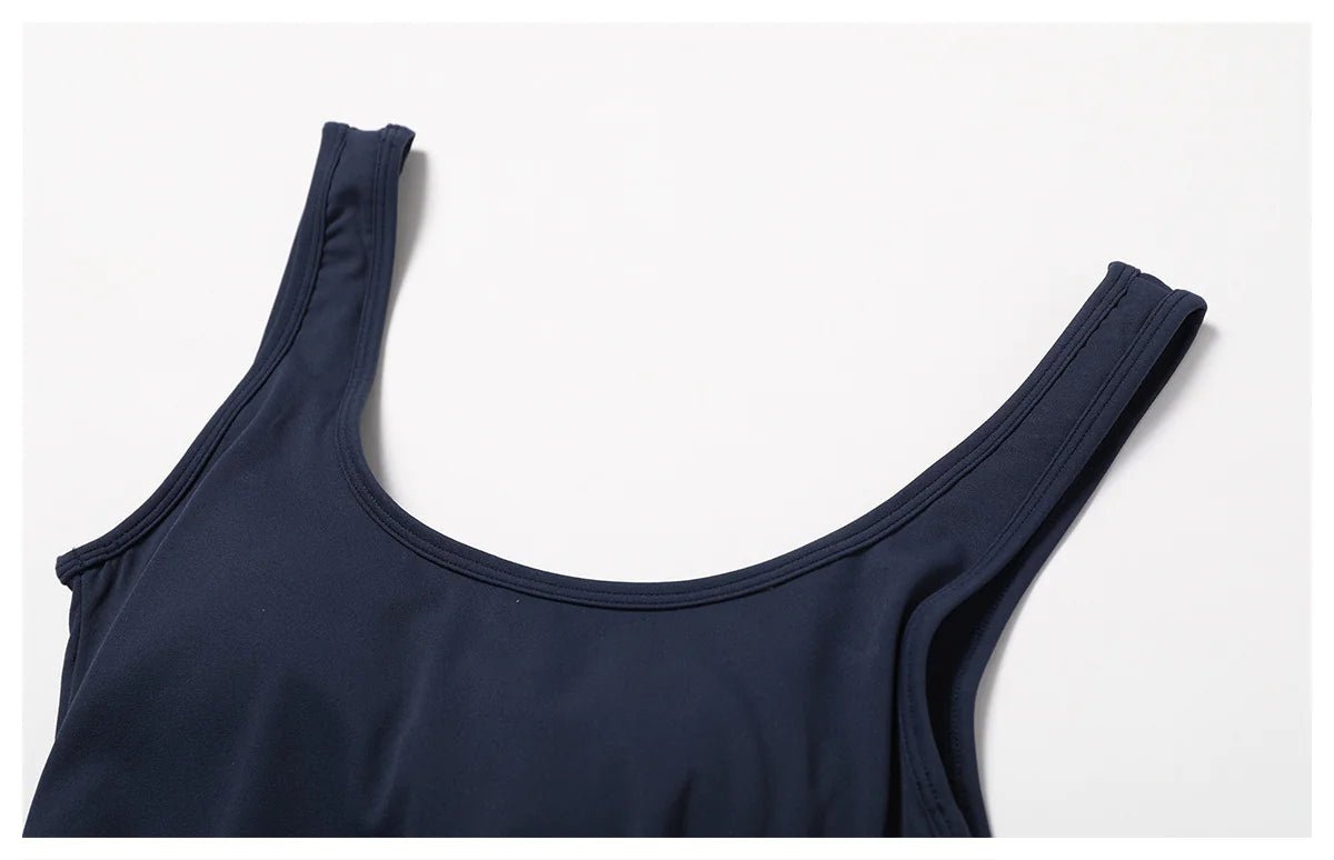 Women's back-out one-piece jumpsuit featuring a sleek, stylish open-back design. Crafted from a comfortable, stretchy material, this jumpsuit combines elegance and practicality, making it perfect for casual outings, workouts, or lounging in chic comfort.- TNT Fitness Gear