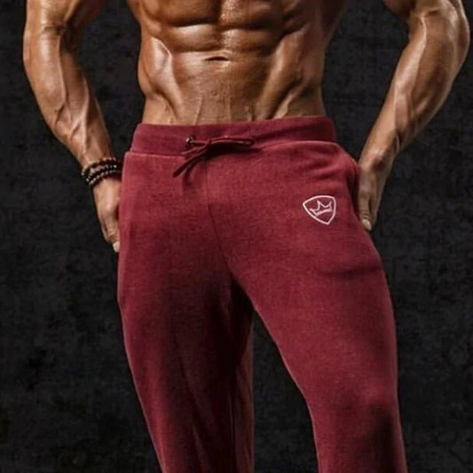 Bodybuilding Fitness Sweatpants - full-length, breathable cotton joggers with a mid-rise waist, loose fit, and adjustable drawstring. Designed for peak performance, stylish comfort, and unrestricted movement, perfect for gym sessions or daily wear - TNT Fitness Gear