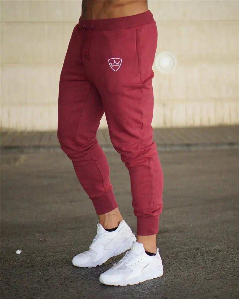 Bodybuilding Fitness Sweatpants - full-length, breathable cotton joggers with a mid-rise waist, loose fit, and adjustable drawstring. Designed for peak performance, stylish comfort, and unrestricted movement, perfect for gym sessions or daily wear - TNT Fitness Gear