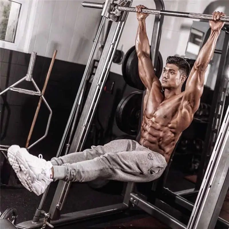 Bodybuilding Fitness Sweatpants - full-length, breathable cotton joggers with a mid-rise waist, loose fit, and adjustable drawstring. Designed for peak performance, stylish comfort, and unrestricted movement, perfect for gym sessions or daily wear - TNT Fitness Gear