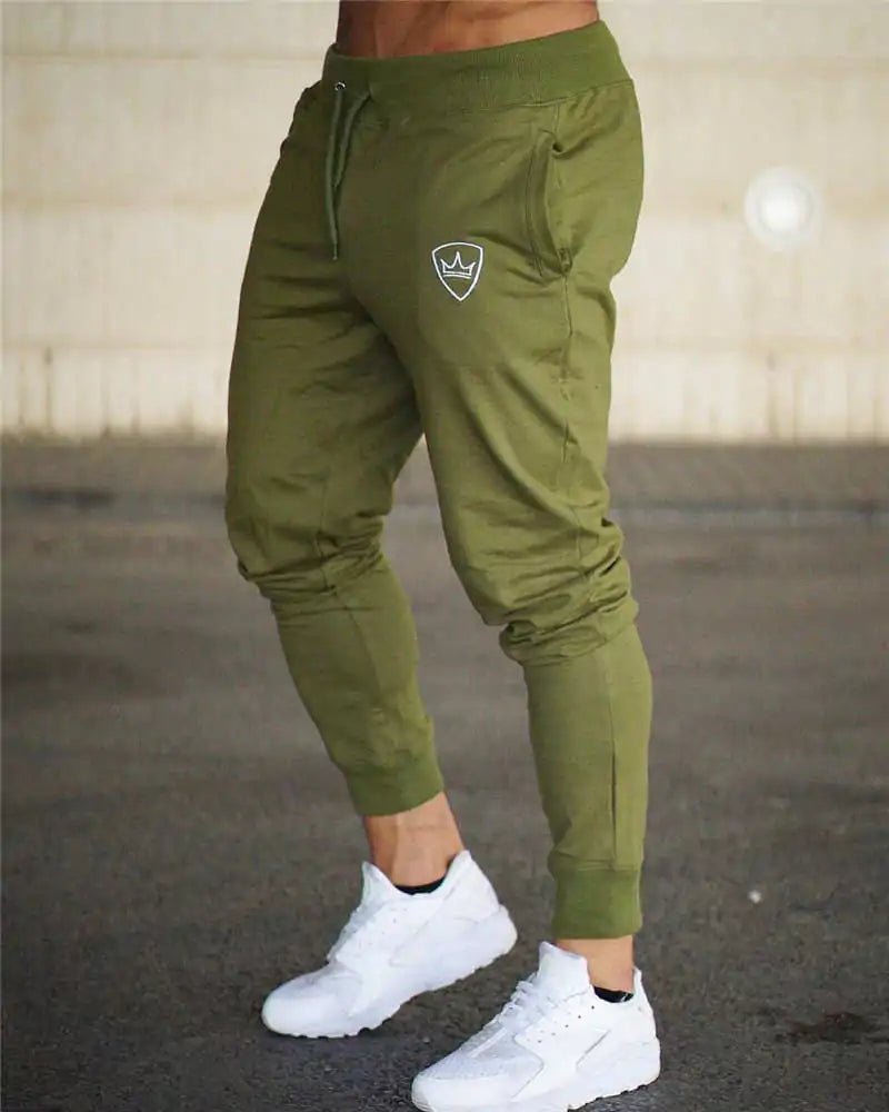 Bodybuilding Fitness Sweatpants - full-length, breathable cotton joggers with a mid-rise waist, loose fit, and adjustable drawstring. Designed for peak performance, stylish comfort, and unrestricted movement, perfect for gym sessions or daily wear - TNT Fitness Gear