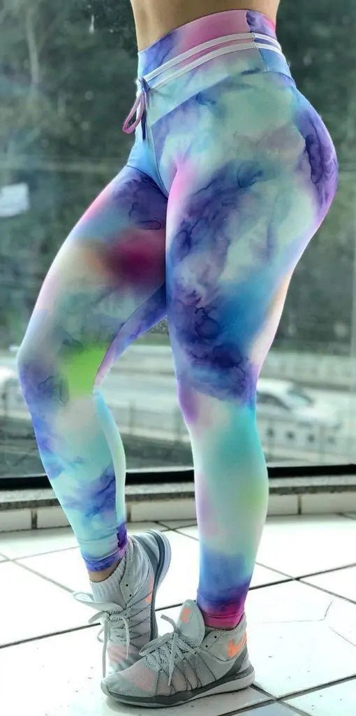 Women's cotton candy print push-up workout leggings featuring a vibrant, colorful design. Made with stretchy, breathable fabric for a flattering fit and enhanced comfort. Ideal for dynamic workouts, yoga sessions, or adding a fun flair to casual athleisure outfits - TNT Fitness Gear