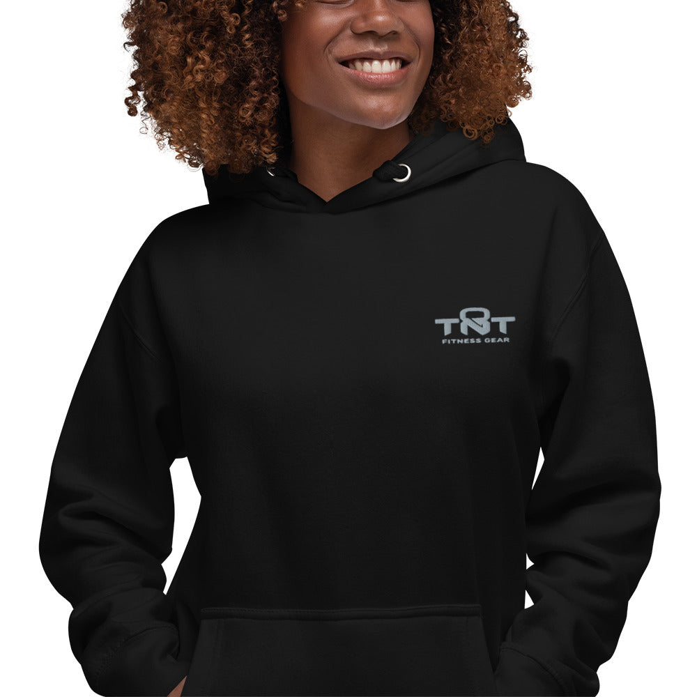 Black unisex TNT Fitness Gear hoodie with minimalist chest logo, front pouch pocket, and athletic fit for gym and lifestyle wear.