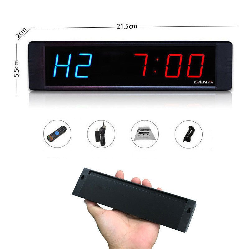 1-inch Electronic Countdown Training Timer with vibrant blue and red LED displays for outstanding visibility. Features an intuitive interface, infrared remote control, and durable aluminum design. Perfect for home, gym, or office workouts with wall-mount installation.- TNT Fitness Gear