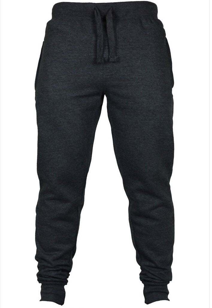 Men’s elasticated track pants with a drawstring waist, offering a snug fit and flexibility for any activity. Made from breathable, moisture-wicking fabric, these pants are ideal for jogging, gym workouts, or lounging.
