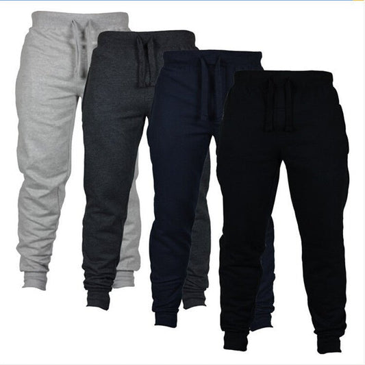 Men’s elasticated track pants with a drawstring waist, offering a snug fit and flexibility for any activity. Made from breathable, moisture-wicking fabric, these pants are ideal for jogging, gym workouts, or lounging.