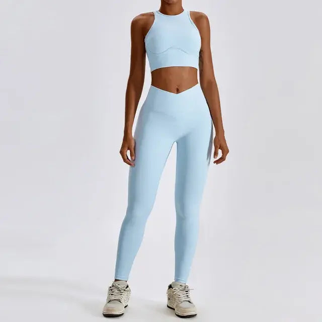 Stylish and comfortable women's two-piece fitness gym wear set featuring a matching sports bra and high-waisted leggings. Ideal for workouts, yoga, and casual wear, made from stretchy, moisture-wicking fabric
