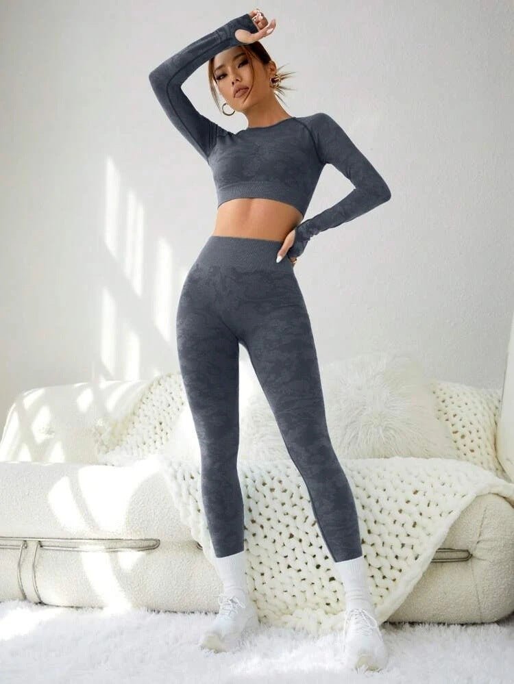 Stylish two-piece gym and yoga set featuring a solid-color design in vibrant shades of red, blue, green, and gray, crafted from high-quality nylon for comfort and performance. - TNT Fitness Gear