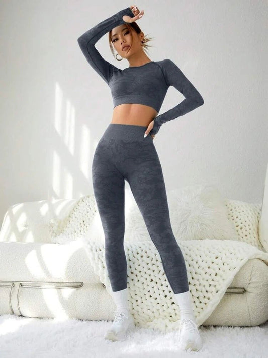 Stylish two-piece gym and yoga set featuring a solid-color design in vibrant shades of red, blue, green, and gray, crafted from high-quality nylon for comfort and performance. - TNT Fitness Gear