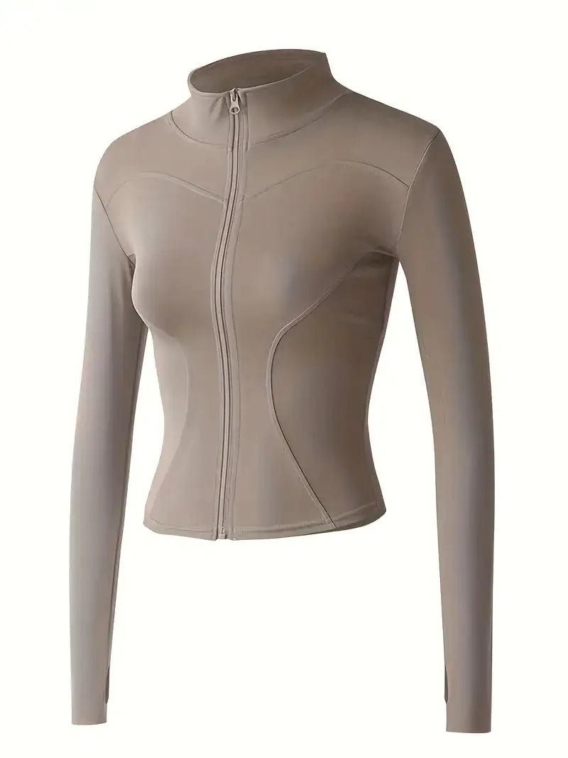 Women's lightweight zip-up yoga and workout jacket, designed for comfort and functionality. Made with breathable, stretchy fabric, this jacket offers a sleek fit and features a full zipper for easy layering. Perfect for yoga, workouts, or casual athleisure wear.- TNT Fitness Gear