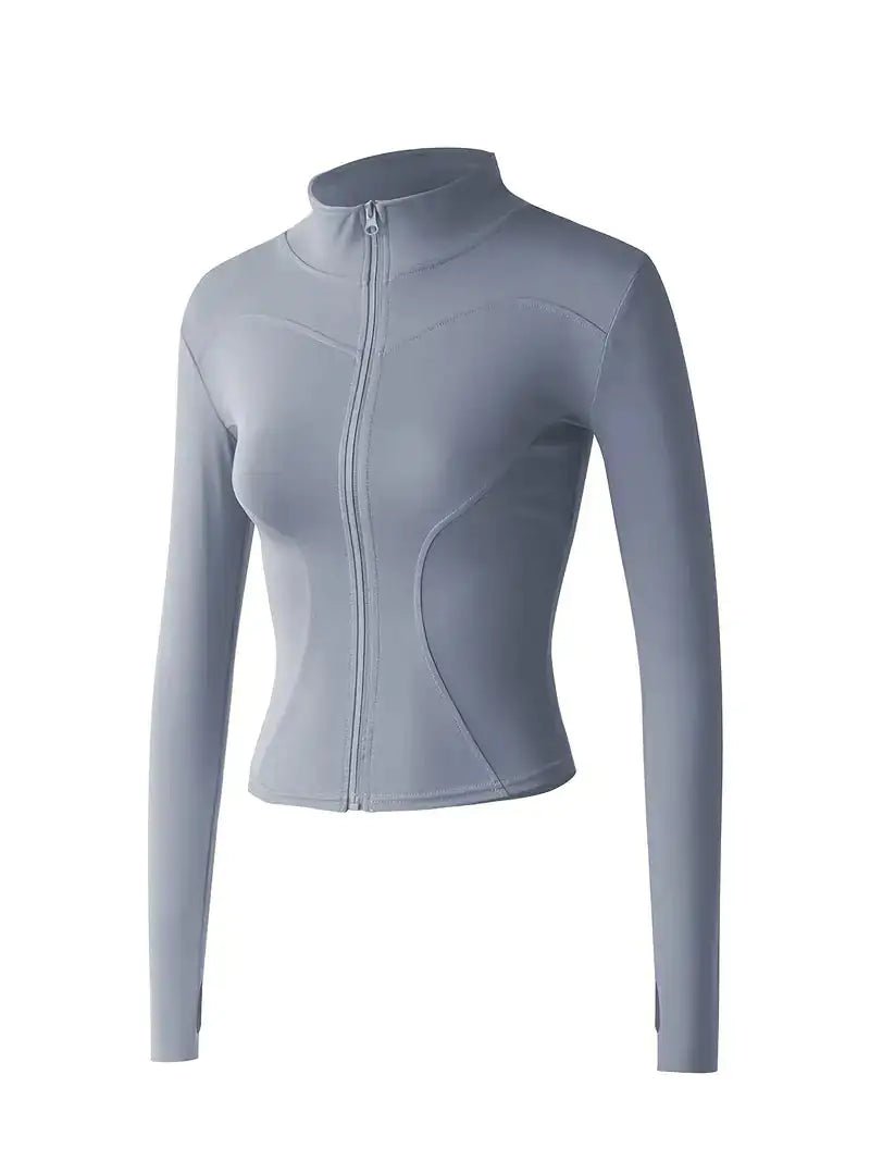 Women's lightweight zip-up yoga and workout jacket, designed for comfort and functionality. Made with breathable, stretchy fabric, this jacket offers a sleek fit and features a full zipper for easy layering. Perfect for yoga, workouts, or casual athleisure wear.- TNT Fitness Gear