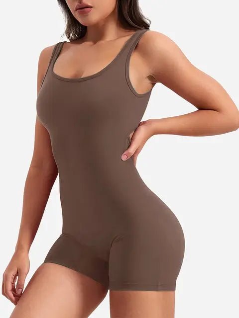 Women's back-out shorts workout jumpsuit featuring a stylish open-back design and a comfortable, snug fit. Made with breathable, stretchy fabric, this versatile jumpsuit is ideal for workouts, yoga, or casual athleisure wear - TNT Fitness Gear