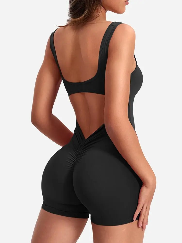 Women's back-out shorts workout jumpsuit featuring a stylish open-back design and a comfortable, snug fit. Made with breathable, stretchy fabric, this versatile jumpsuit is ideal for workouts, yoga, or casual athleisure wear - TNT Fitness Gear