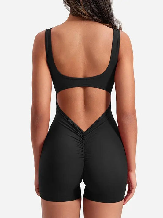 Women's back-out shorts workout jumpsuit featuring a stylish open-back design and a comfortable, snug fit. Made with breathable, stretchy fabric, this versatile jumpsuit is ideal for workouts, yoga, or casual athleisure wear - TNT Fitness Gear