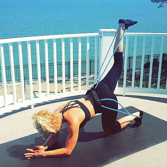 Fitness resistance bands designed for versatile workouts. Perfect for strength training, muscle toning, and rehabilitation exercises. Lightweight, portable, and suitable for various fitness levels, ideal for use at home, in the gym, or on the go -TNT Fitness Gear