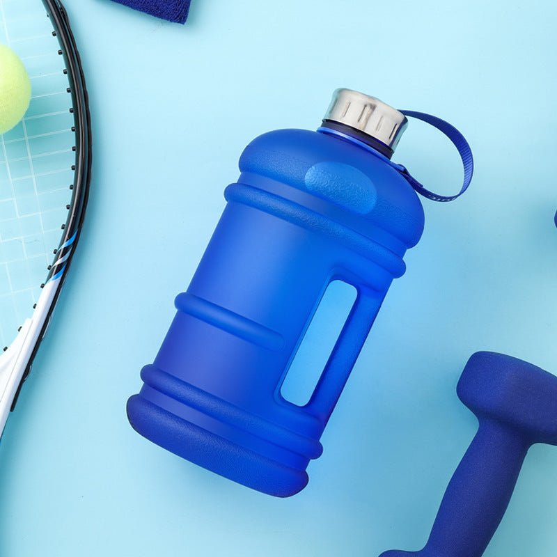1.3L large-capacity fitness water bottle with a measurement scale for tracking hydration. Durable, lightweight, and designed for fitness enthusiasts, perfect for workouts, outdoor activities, or daily hydration needs -TNT Fitness Gear