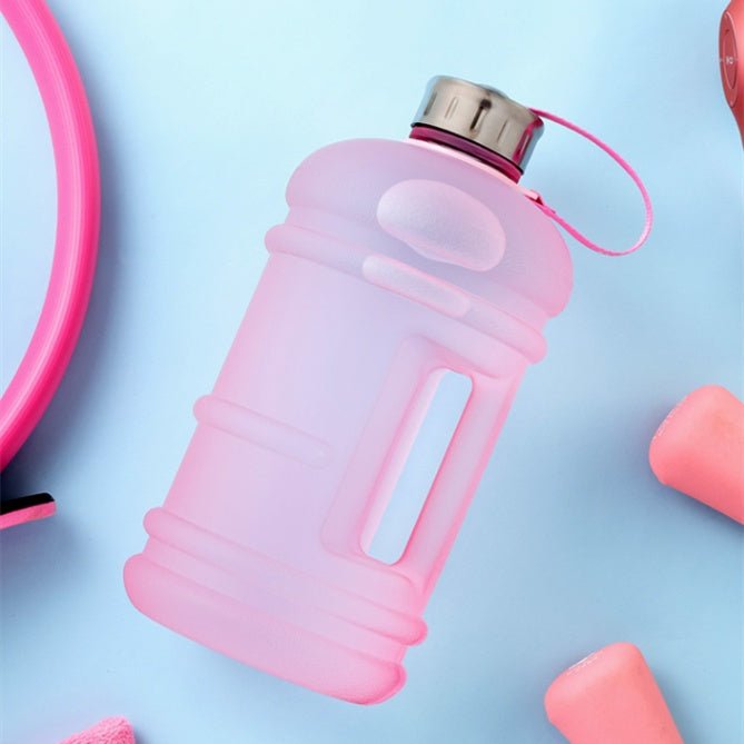 1.3L large-capacity fitness water bottle with a measurement scale for tracking hydration. Durable, lightweight, and designed for fitness enthusiasts, perfect for workouts, outdoor activities, or daily hydration needs -TNT Fitness Gear
