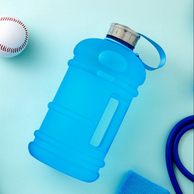 1.3L large-capacity fitness water bottle with a measurement scale for tracking hydration. Durable, lightweight, and designed for fitness enthusiasts, perfect for workouts, outdoor activities, or daily hydration needs -TNT Fitness Gear