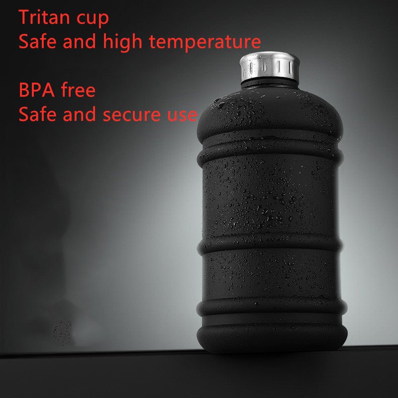 1.3L large-capacity fitness water bottle with a measurement scale for tracking hydration. Durable, lightweight, and designed for fitness enthusiasts, perfect for workouts, outdoor activities, or daily hydration needs -TNT Fitness Gear