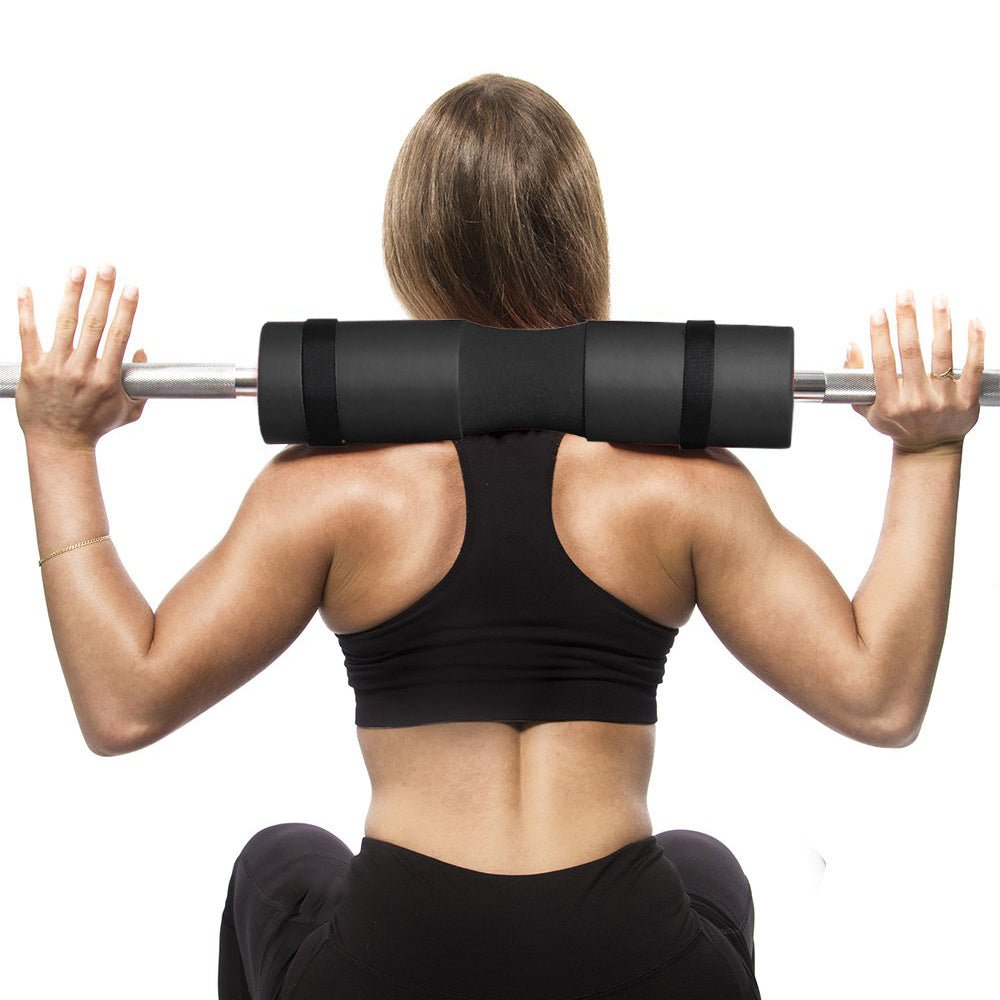 Foam barbell pad cover designed to enhance comfort and support during lifting exercises. Made with durable, cushioned material to protect shoulders and neck from pressure, ensuring safer and more comfortable squats, lunges, and other barbell workouts. Perfect for fitness enthusiasts seeking a secure and ergonomic experience. - TNT Fitness Gear