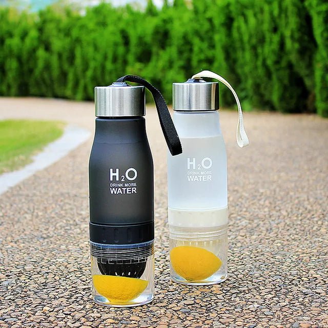 Fruit infusion water bottle designed for refreshing hydration, featuring a leak-proof design and built-in infuser to create healthy, flavorful drinks with fruits and herbs. Durable, eco-friendly, and perfect for on-the-go use, from the gym to outdoor adventures.- TNT Fitness