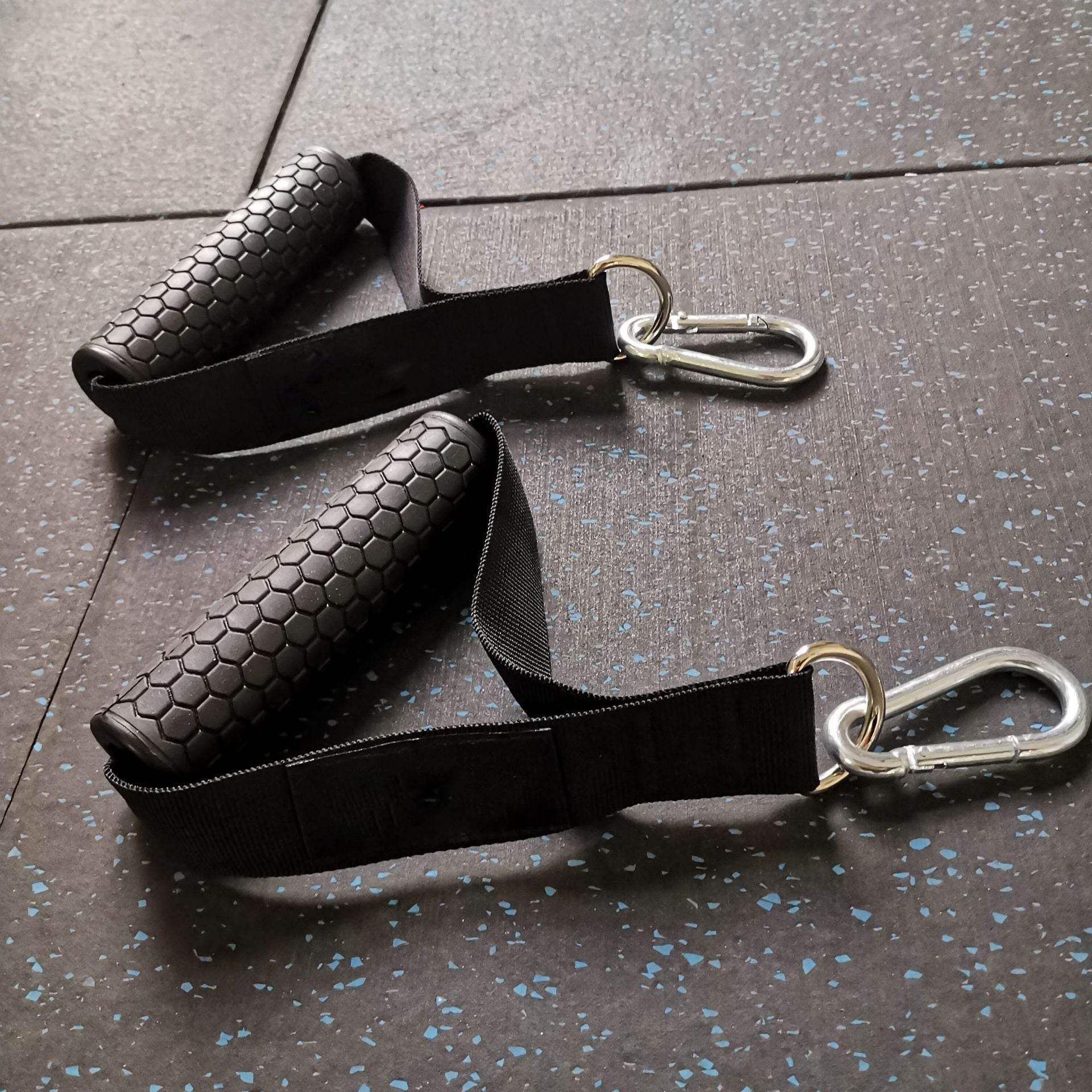 Anti-Slip Gym Exercise Handles designed for cable machines, featuring a strong grip and durable construction. Ideal for strength training, providing comfort and stability during intense workouts. TNT Fitness Gear