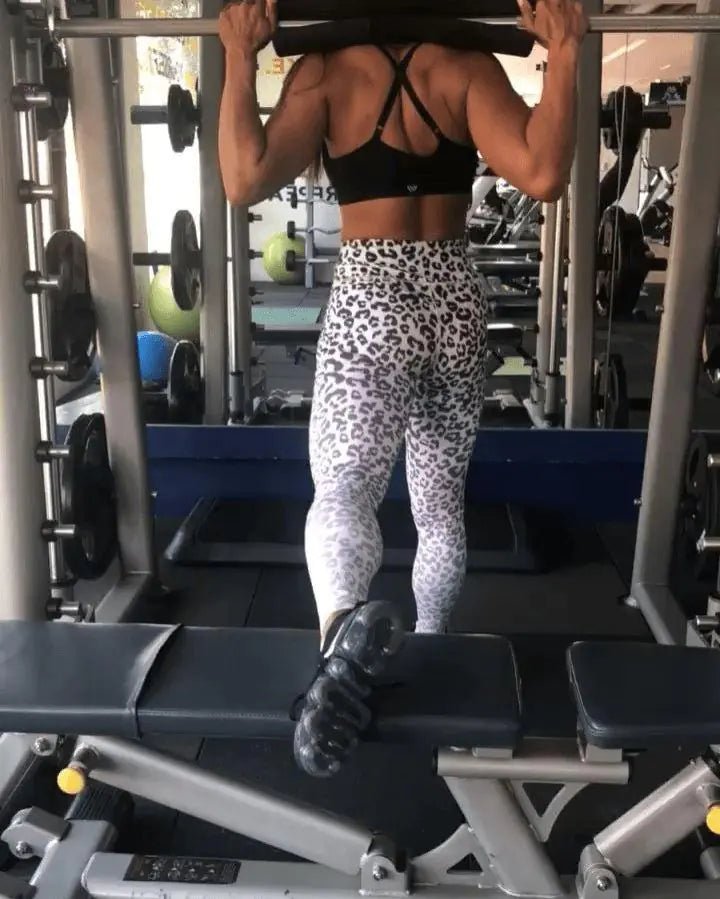 High-waist fitness leggings featuring a bold leopard print design. Made with stretchable, moisture-wicking fabric for a flattering fit and ultimate comfort. Perfect for workouts, yoga sessions, or adding a stylish edge to casual athleisure wear- TNT Fitness Gear