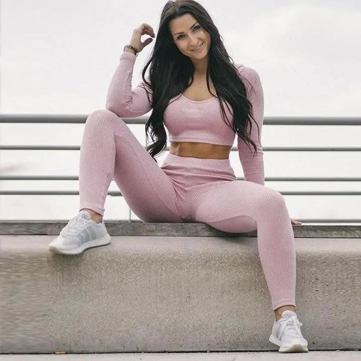 Women's Hyper Fit 2-piece workout set featuring a fitted top and matching bottoms. Designed with stretchable and moisture-wicking fabric for enhanced performance and comfort. A sleek and stylish outfit ideal for fitness activities, yoga, or casual athleisure wear - TNT Fitness Gear