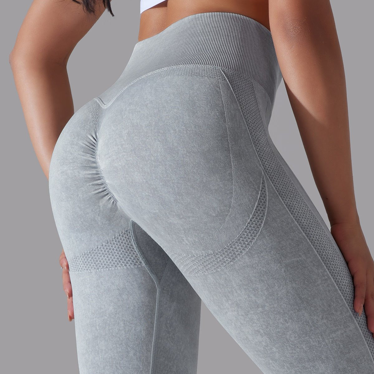 Seamless knitted high-waisted yoga pants designed for running and fitness, featuring a figure-flattering, butt-lifting design in a stretchy, breathable material for maximum comfort and style during workouts.- TNT Fitness Gear