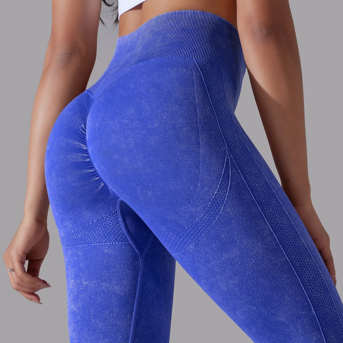 Seamless knitted high-waisted yoga pants designed for running and fitness, featuring a figure-flattering, butt-lifting design in a stretchy, breathable material for maximum comfort and style during workouts.- TNT Fitness Gear