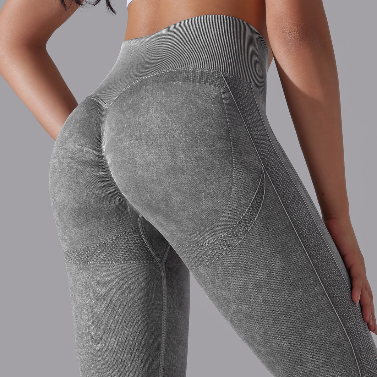 Seamless knitted high-waisted yoga pants designed for running and fitness, featuring a figure-flattering, butt-lifting design in a stretchy, breathable material for maximum comfort and style during workouts.- TNT Fitness Gear