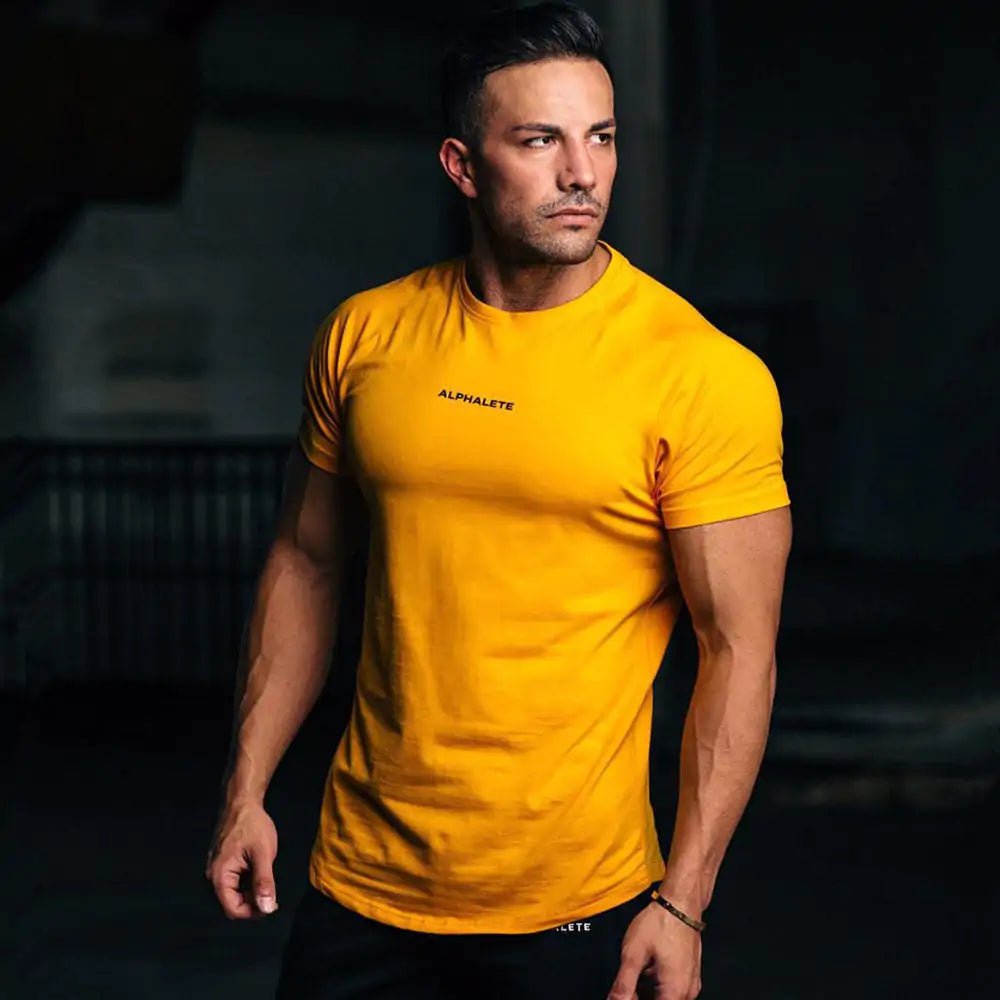 Men's Fitted Gym T-Shirt: Premium 100% cotton T-shirt with a breathable, moisture-wicking design and a flattering slim fit, ideal for gym workouts, running, or casual wear. TNT Fitness Gear