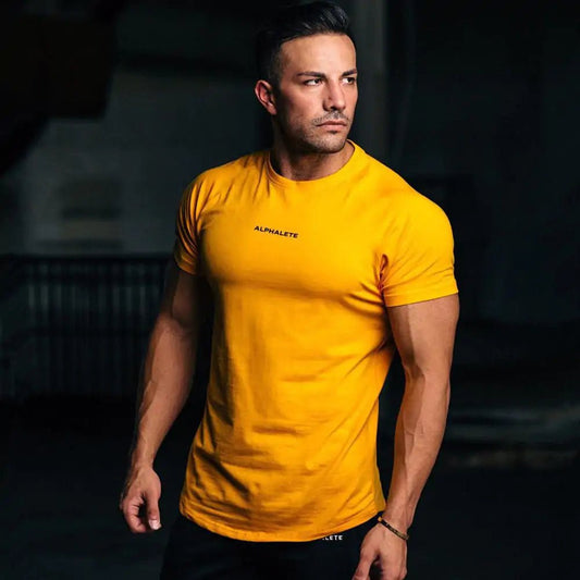 Men's Fitted Gym T-Shirt: Premium 100% cotton T-shirt with a breathable, moisture-wicking design and a flattering slim fit, ideal for gym workouts, running, or casual wear. TNT Fitness Gear