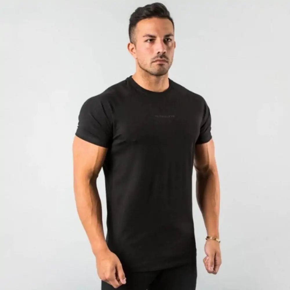 Men's Fitted Gym T-Shirt: Premium 100% cotton T-shirt with a breathable, moisture-wicking design and a flattering slim fit, ideal for gym workouts, running, or casual wear. TNT Fitness Gear