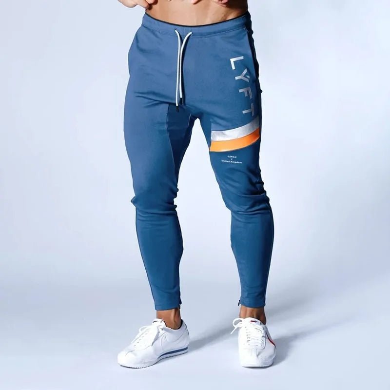 Men's Fitness Sweatpants - lightweight, breathable joggers with elastic waistband for comfort and tapered legs for a sleek look. Features moisture-wicking fabric and side pockets for essentials. Perfect for workouts or lounging. Available in stylish colors - TNT Fitness Gear