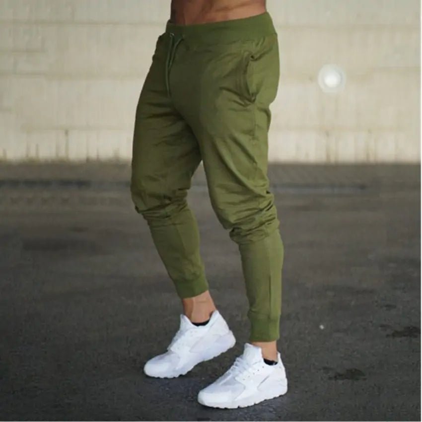 Premium men's athletic sweatpants with elastic waist and sleek design. Perfect for comfort and style by TNT Fitness Gear