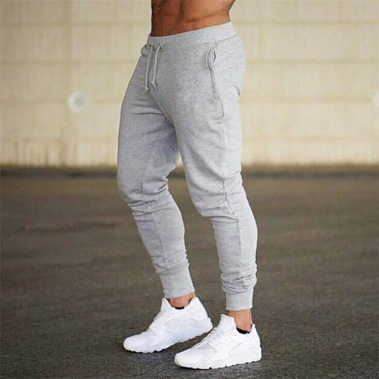 Premium men's athletic sweatpants with elastic waist and sleek design. Perfect for comfort and style by TNT Fitness Gear