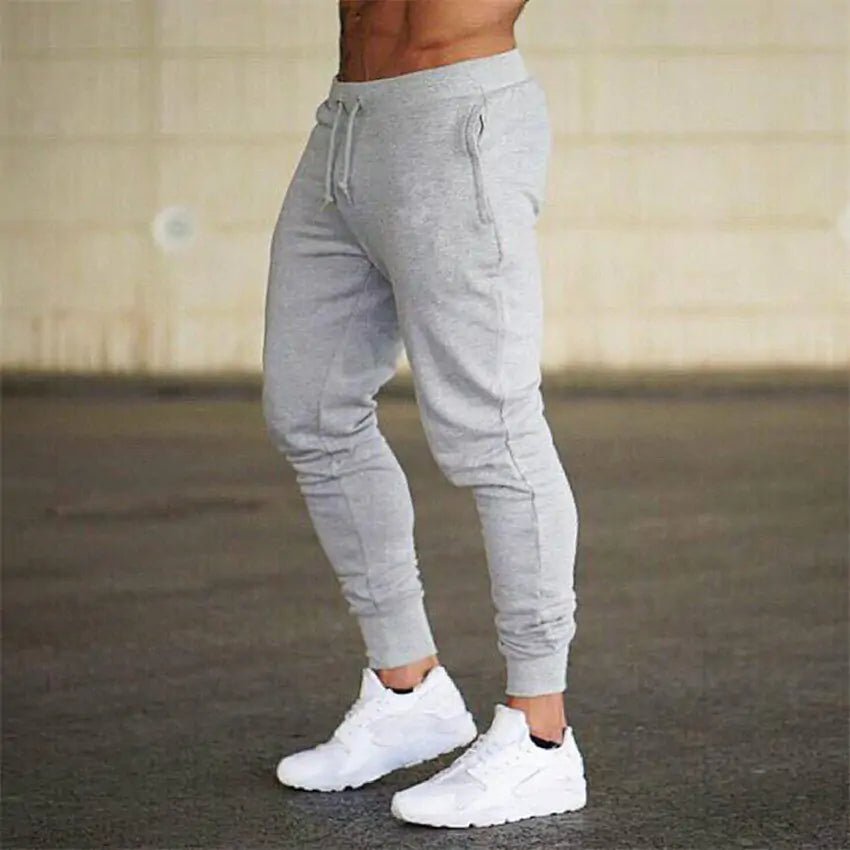 Premium men's athletic sweatpants with elastic waist and sleek design. Perfect for comfort and style by TNT Fitness Gear