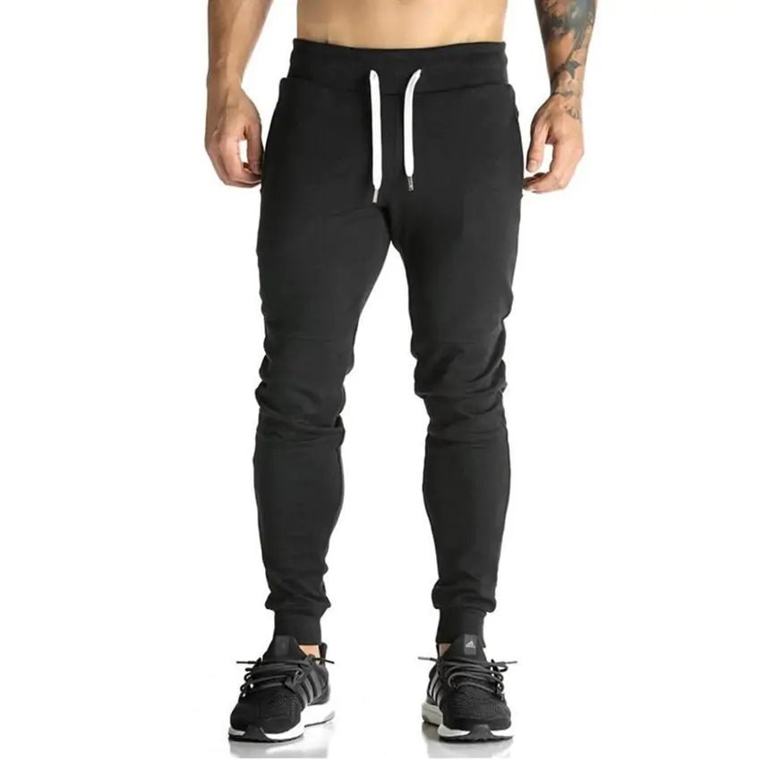 Premium men's athletic sweatpants with elastic waist and sleek design. Perfect for comfort and style by TNT Fitness Gear