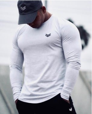 Men's quick-dry long sleeve gym shirt for fitness, running, and bodybuilding. Perfect workout gear by TNT Fitness Gear