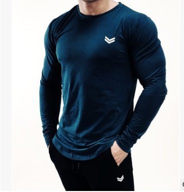 Men's quick-dry long sleeve gym shirt for fitness, running, and bodybuilding. Perfect workout gear by TNT Fitness Gear