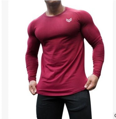Men's quick-dry long sleeve gym shirt for fitness, running, and bodybuilding. Perfect workout gear by TNT Fitness Gear