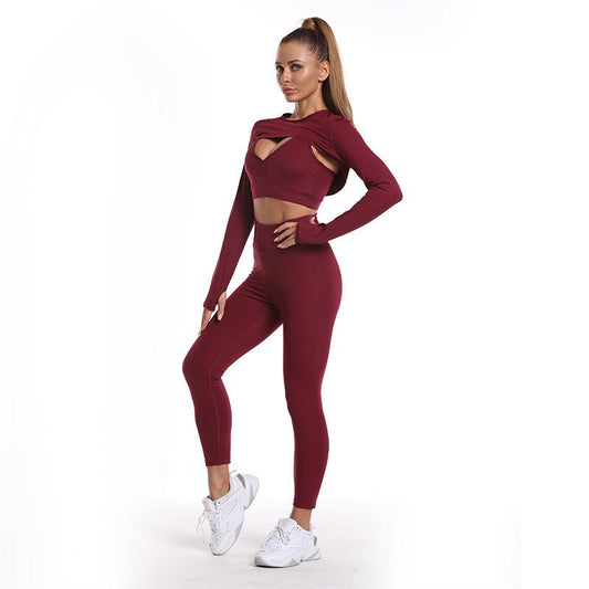 Women's 3-piece fitness and yoga set featuring a short top, a supportive sports bra, and butt lift pants. Designed with breathable, stretchable materials for optimal comfort and performance. A versatile and stylish ensemble suitable for workouts, yoga sessions, or casual athleisure wear.- TNT Fitness Gear