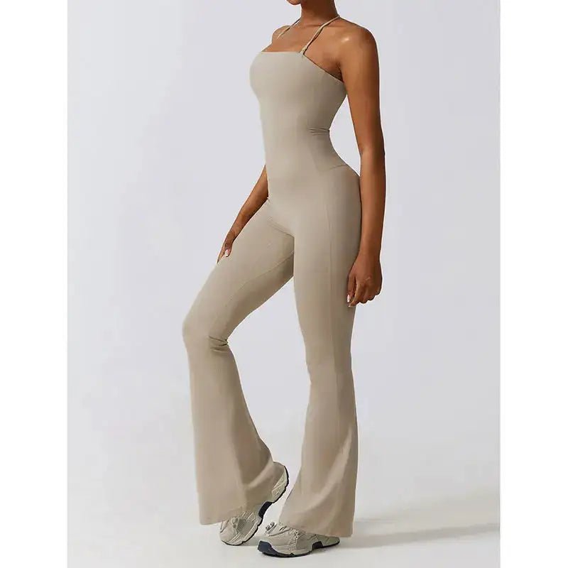 Sleek and supportive women's one-piece workout jumpsuit designed for maximum comfort and flexibility during exercise. Made from breathable, moisture-wicking fabric, it is perfect for gym, yoga, and fitness routines.