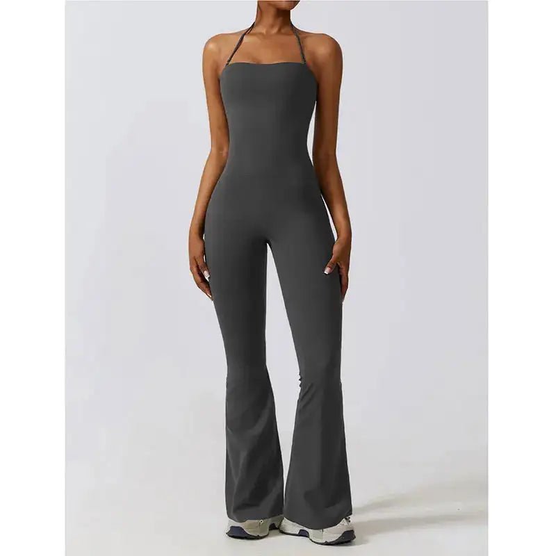 Sleek and supportive women's one-piece workout jumpsuit designed for maximum comfort and flexibility during exercise. Made from breathable, moisture-wicking fabric, it is perfect for gym, yoga, and fitness routines.